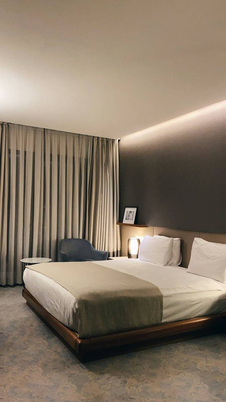 City room with grey headboard