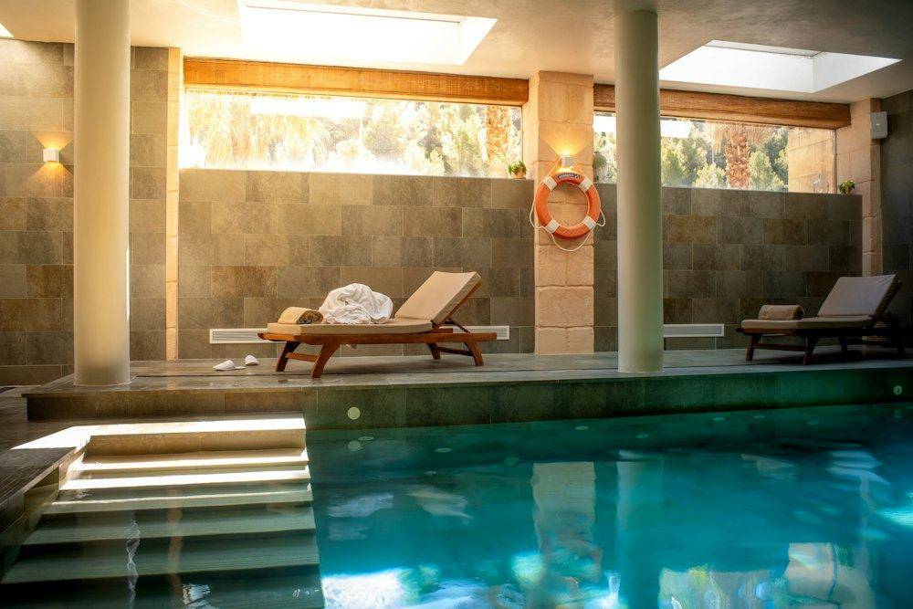 Indoor pool with loungers