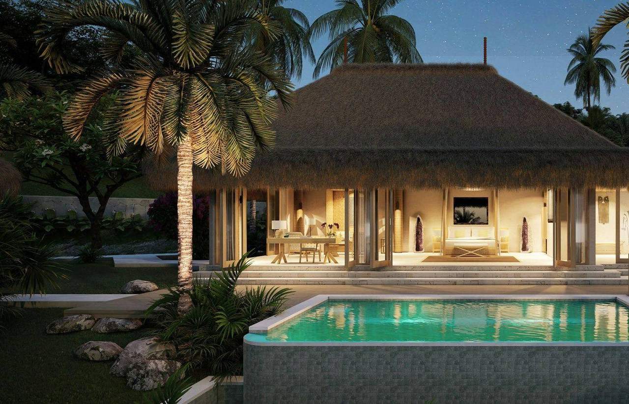 Villa with private pool at dusk