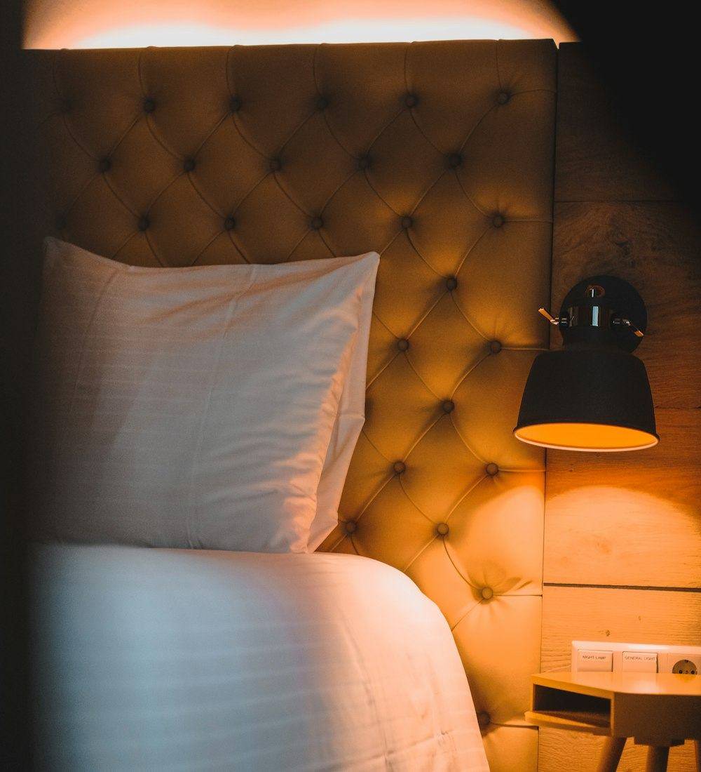 Cosy bed with lamp