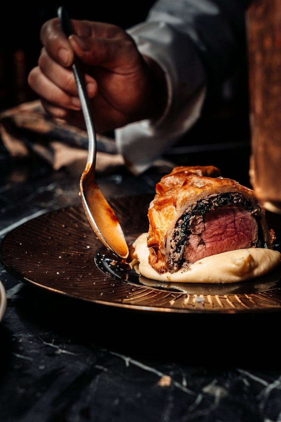 Lamb in pastry being served