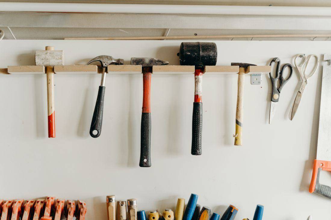 Hammers hanging on a workshop wall